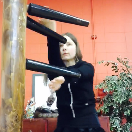 Kung Fu Kendra demonstrating on Wooden Dummy